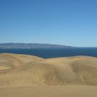 Cielo, ciudad, mar y dunas. 