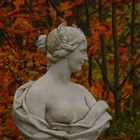 Classic sculpture in autumn park