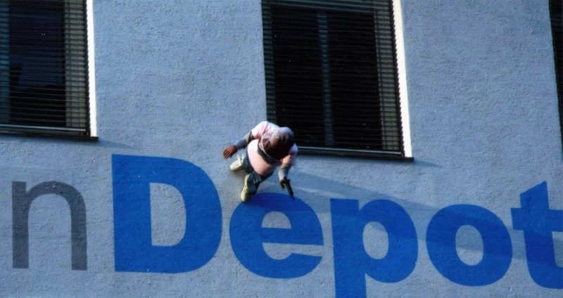 Climb the wall to the depot