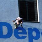 Climb the wall to the depot