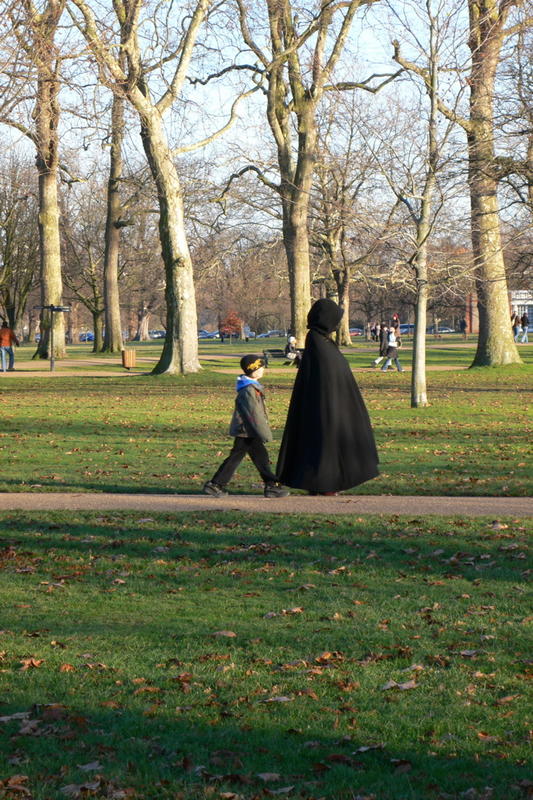 Cloaked Woman and Child