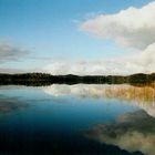 clouds above a swedish lake by Fosserum
