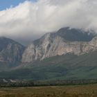 clouds are climbing through the hills