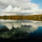 clouds in mirror of the lake in sweden 1996 by Fosserum