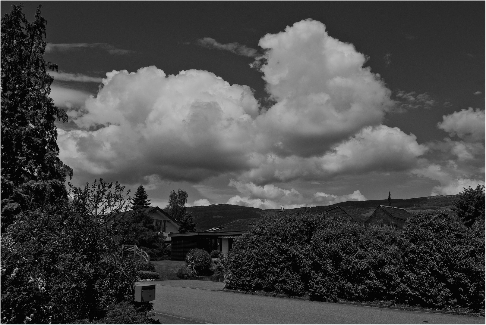 CLOUDS over the Roofs