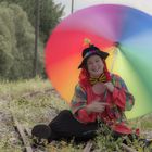 Clown mit Regenschirm