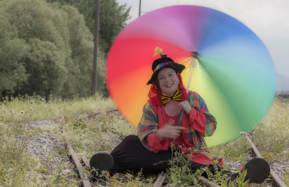 Clown mit Regenschirm