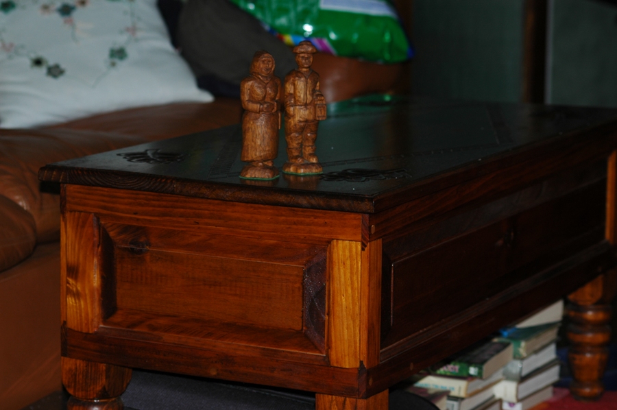 Coal Miner with Wife #3 on hand Carved Table