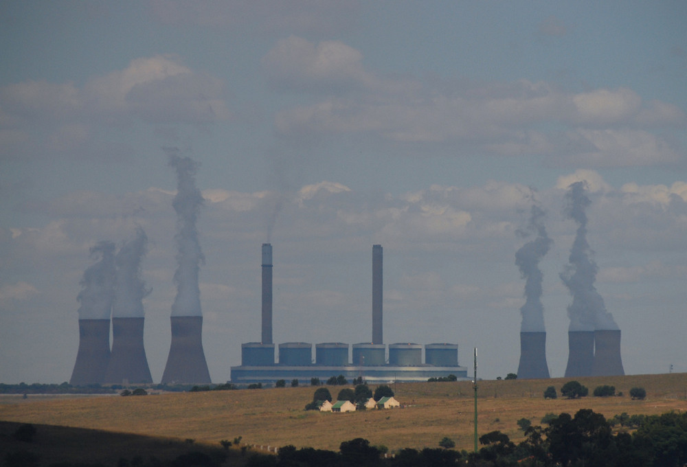 coal powerplant behind the hills