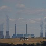 coal powerplant behind the hills