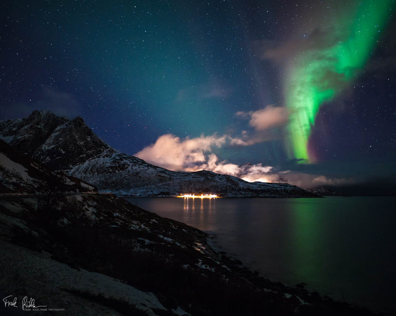 Colorful northern lights over the Ocean.