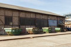 Containers in a Sunday emptiness