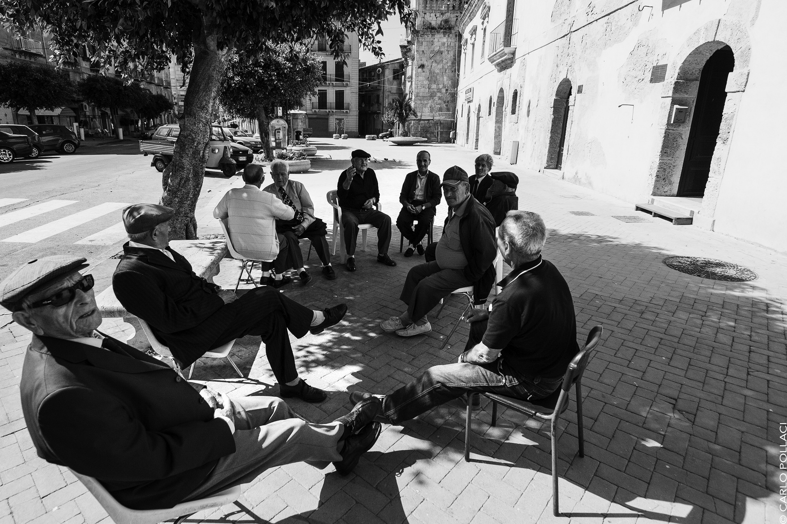 Conversation in the sunny square