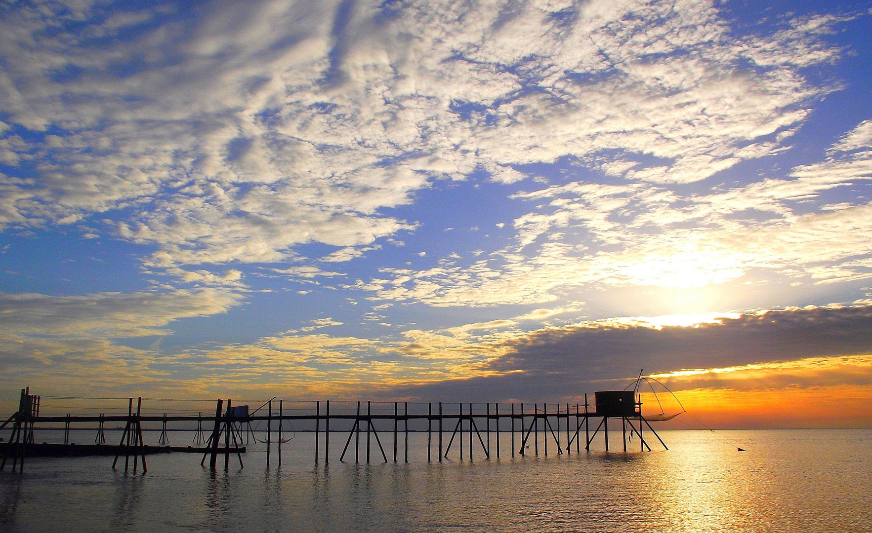 Couchant sur la baie