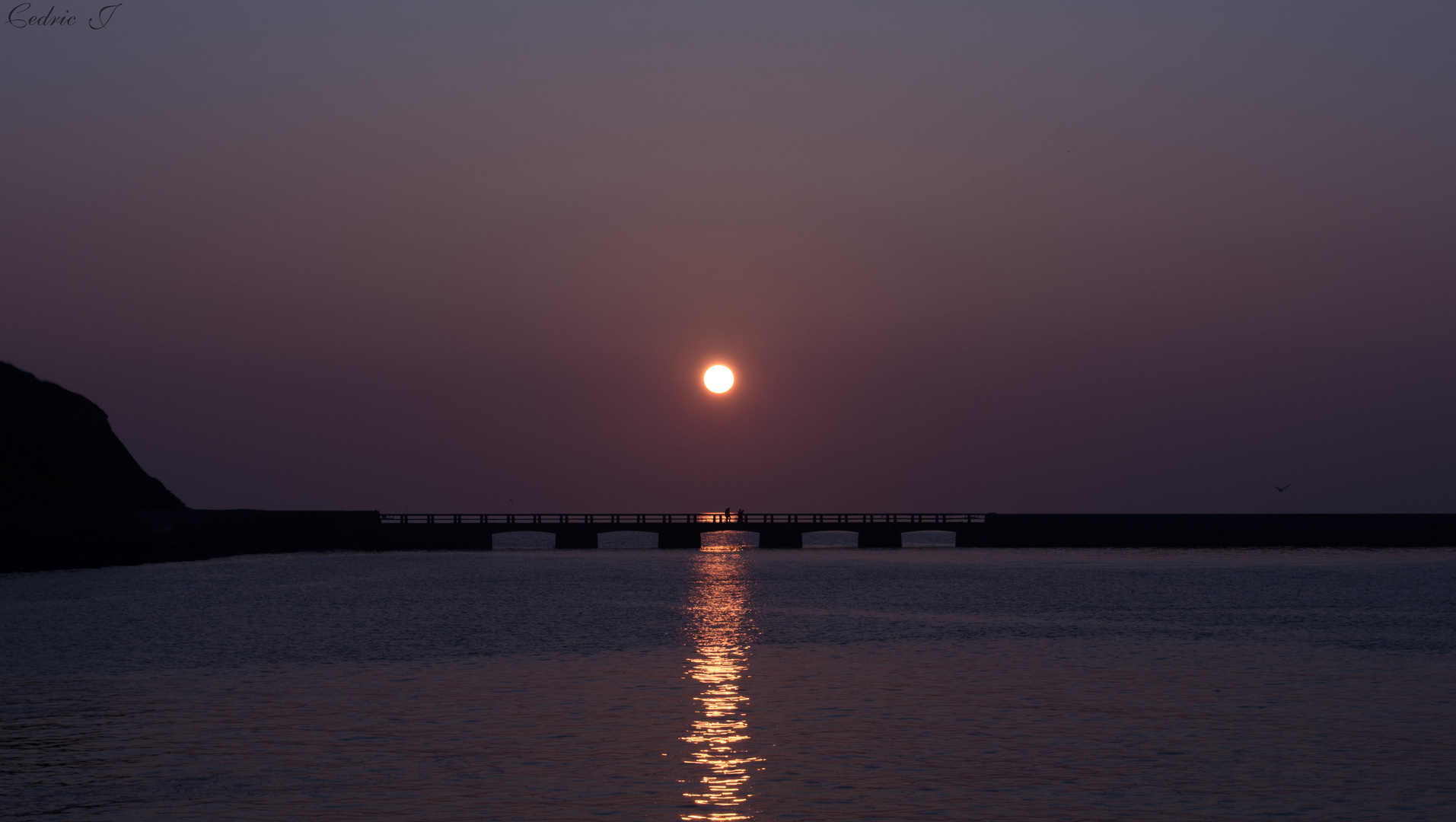 couché de soleil sur port en bessin