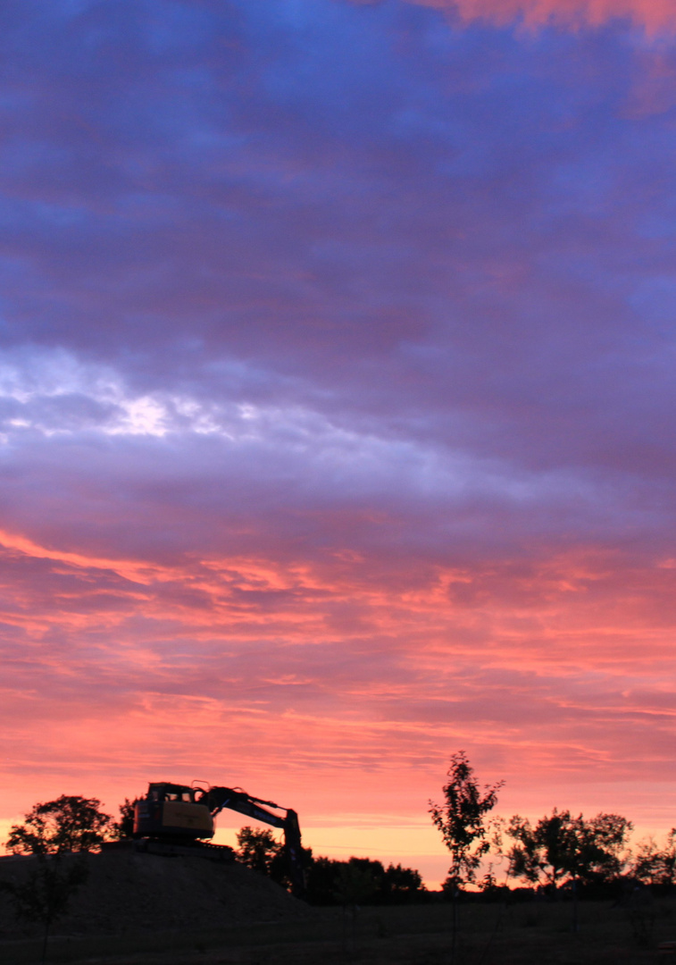 coucher de soleil à la pelleteuse