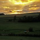 coucher de soleil avec vue sur le pré