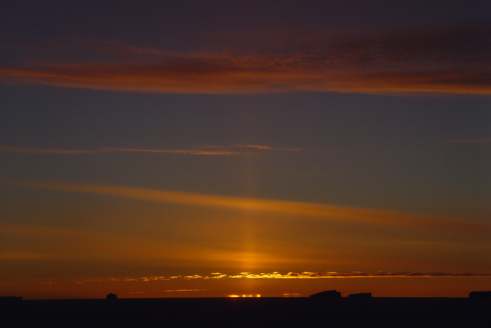 coucher de soleil et dernier rayon