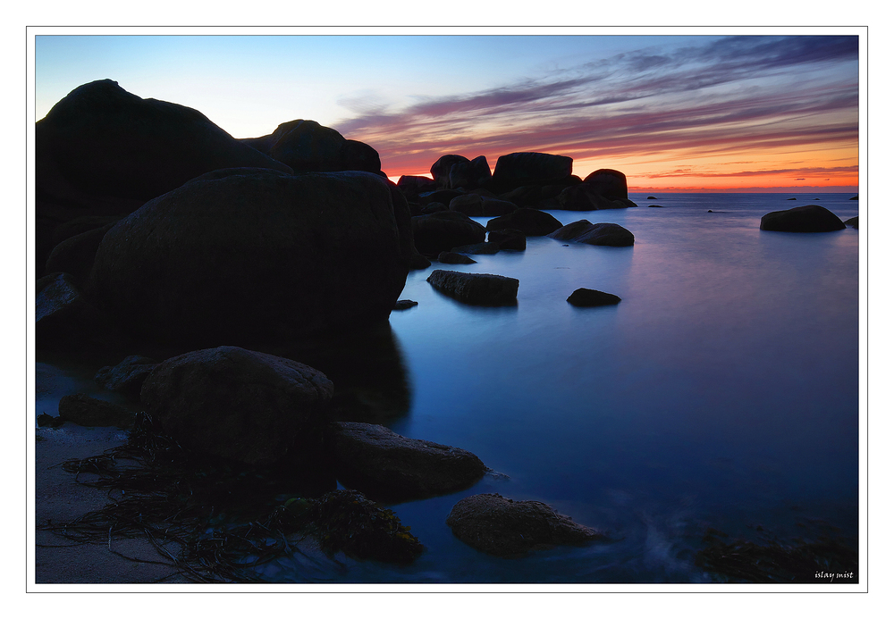 Coucher de soleil, rocher et mer