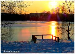coucher de soleil sur le lac gele...
