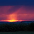 Coucher de soleil sur nuées de pluie