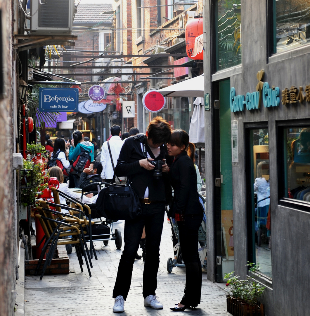 couple checking photos