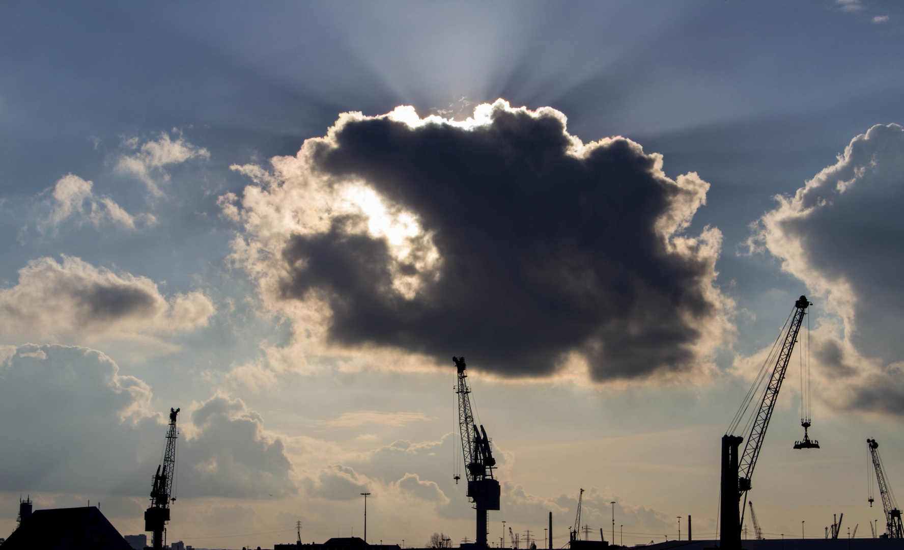 covered sun over the cranes.