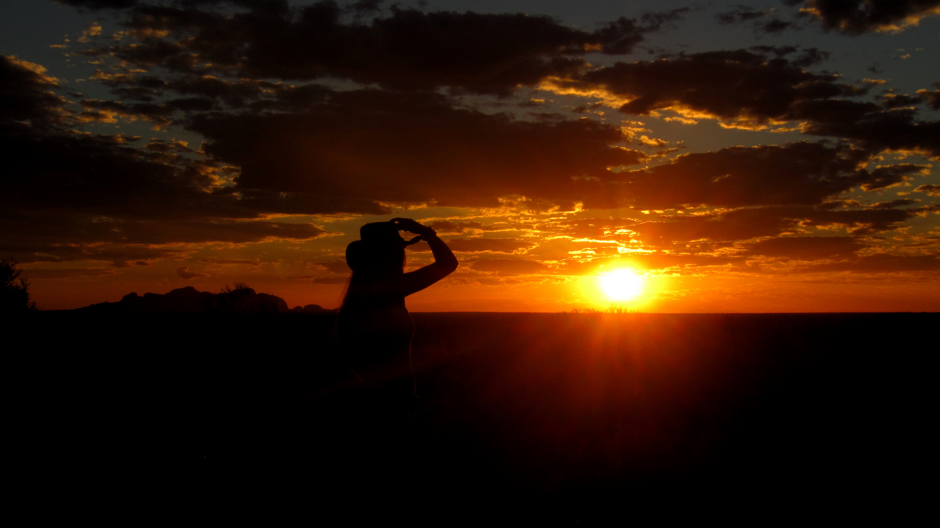 Cowgirl in Sunset