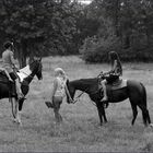 Cowgirls checking on mama and calf.....