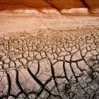 Cracked dried mud in red canyon