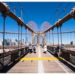 cross the Brooklyn Bridge