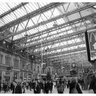 Crowds of people under the great roof of WATERLOO STATION