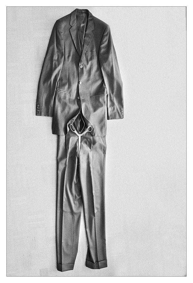 crumpled polyester suit without man