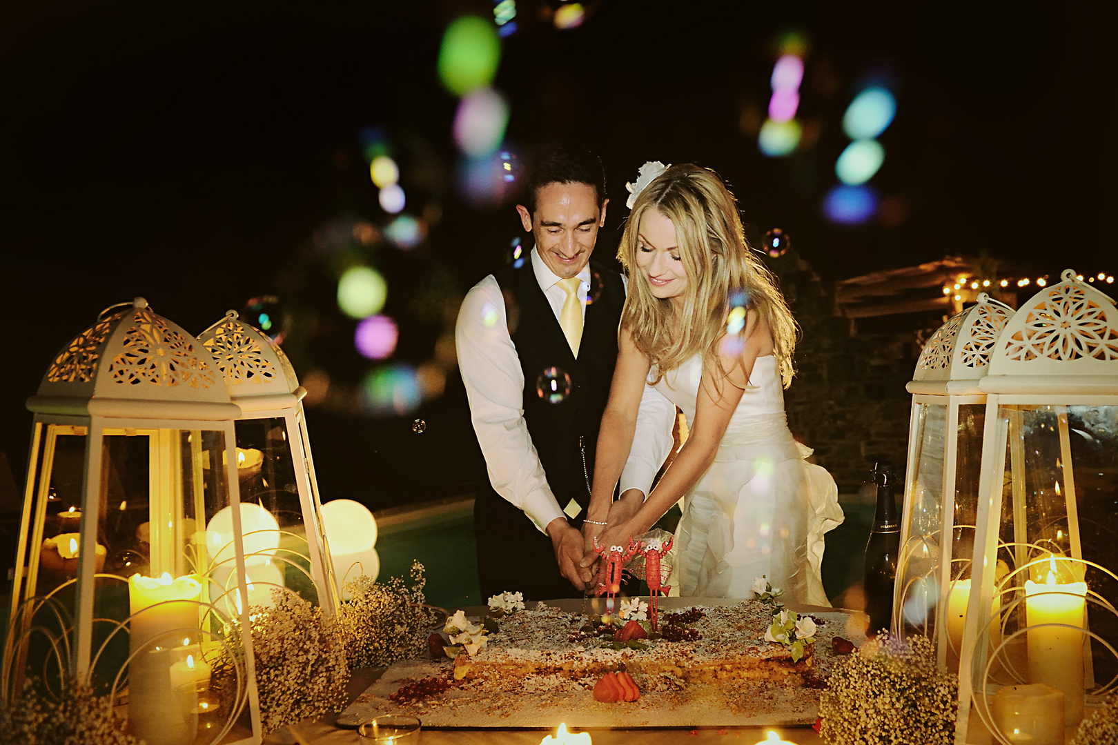 Cutting cake with romantic light.