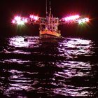 Cuttlefish fisherboat with its strong spotlights