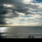 CYCLIST ON THE BEACH