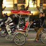 Cyclo taxi in the streets of Hanoi.