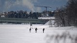 Three skiers on Ice by Raimo Ketolainen