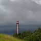 Gewitterwolken am Leuchtturm Campen in Ostfriesland