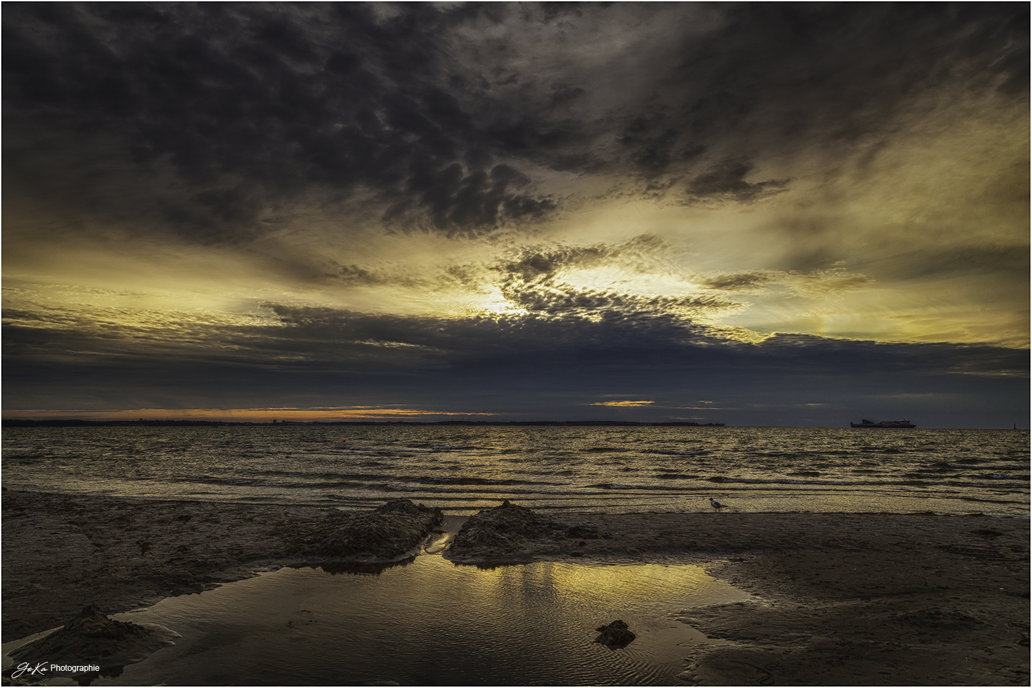 da fällt der Sonnenuntergang ins Wasser