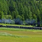 Dampf-Doppeltraktion Albula auf den Schleifen oberhalb von Bergün