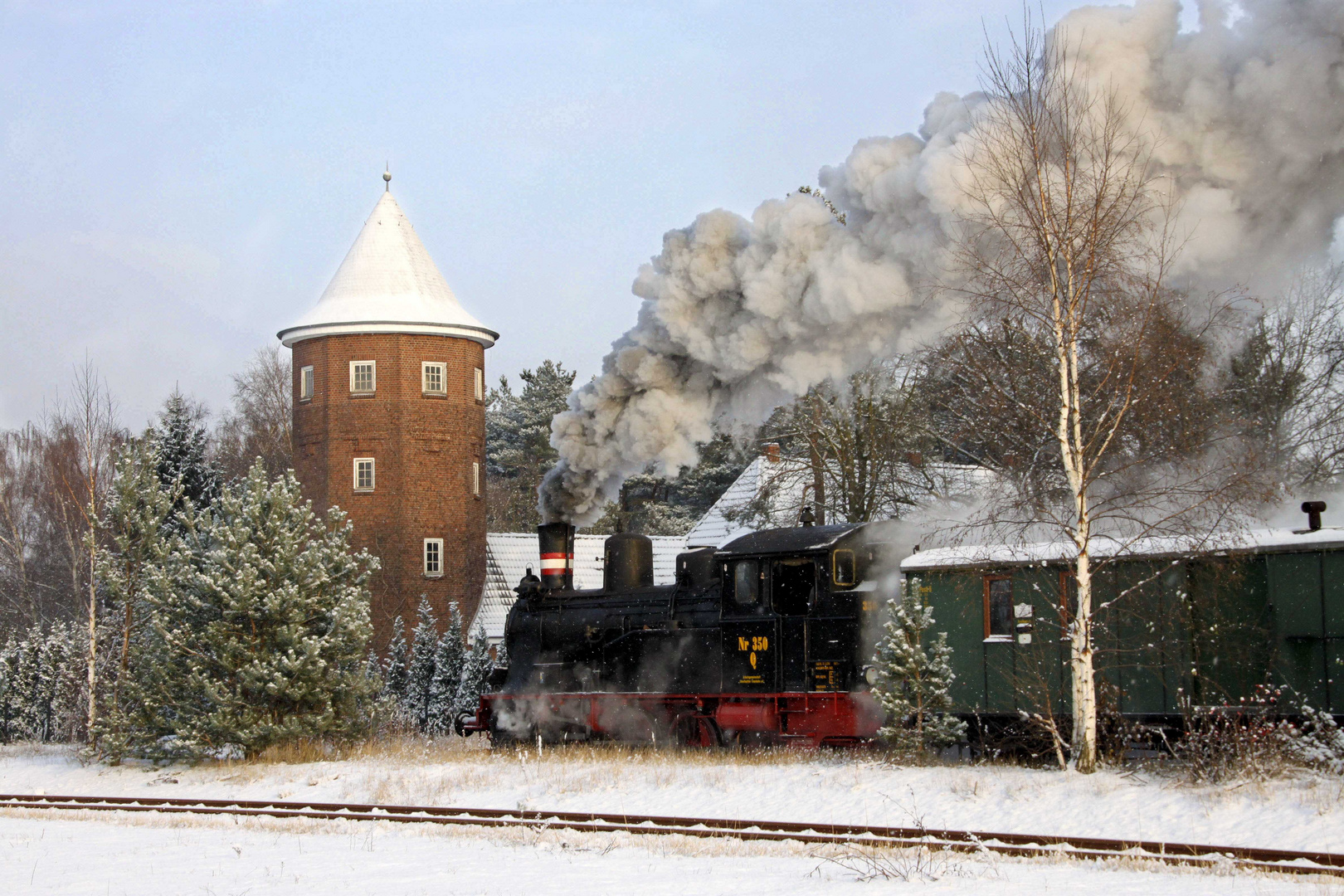 Dampfzug der Geesthachter Eisenbahn bei der Ausfahrt aus dem Geesthachter Bahnhof