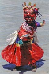 Dance of a demon at the Paro Tsechu