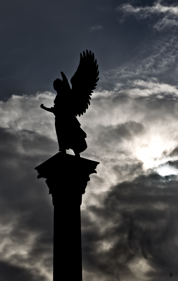 dancing angel on a pillar