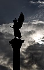 dancing angel on a pillar