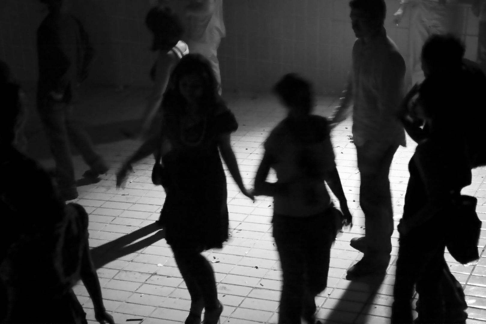 dancing people in pool