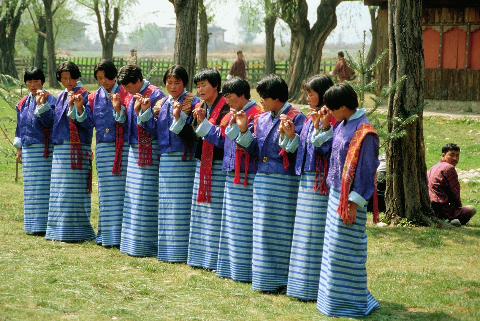 Dancing women in their traditional Kira costumes