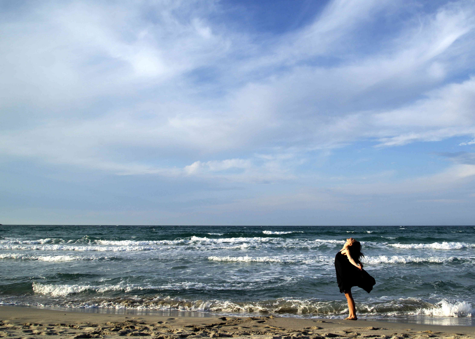 Danzando in riva al mare