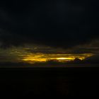 Dark Clouds At Sunset