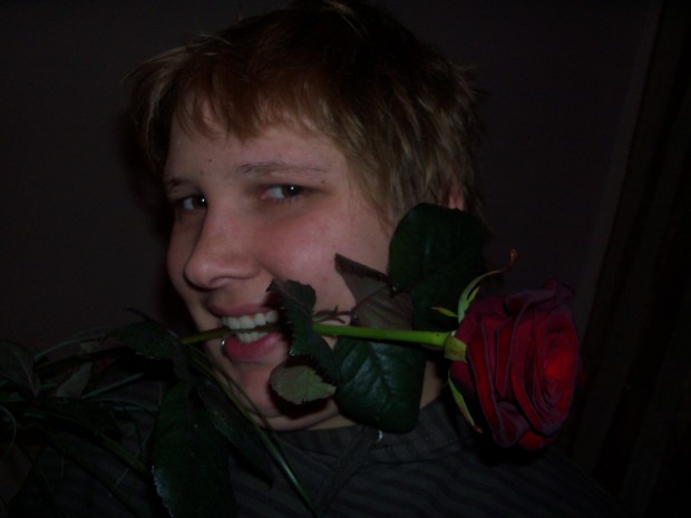 Das bin ich mit einer Rose